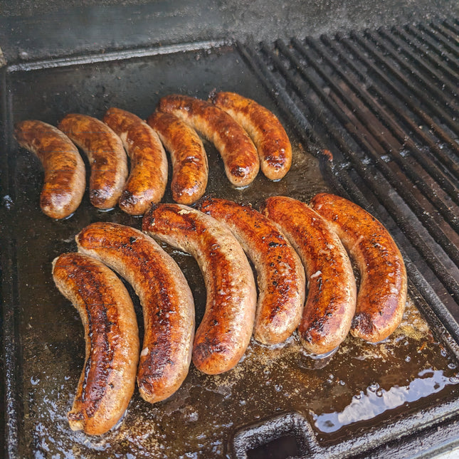 Grilled sausages on a barbecue grill