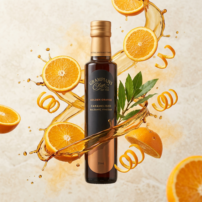 Grampians Olive Co Golden Orange Balsamic with amber balsamic splash, orange slices and zest