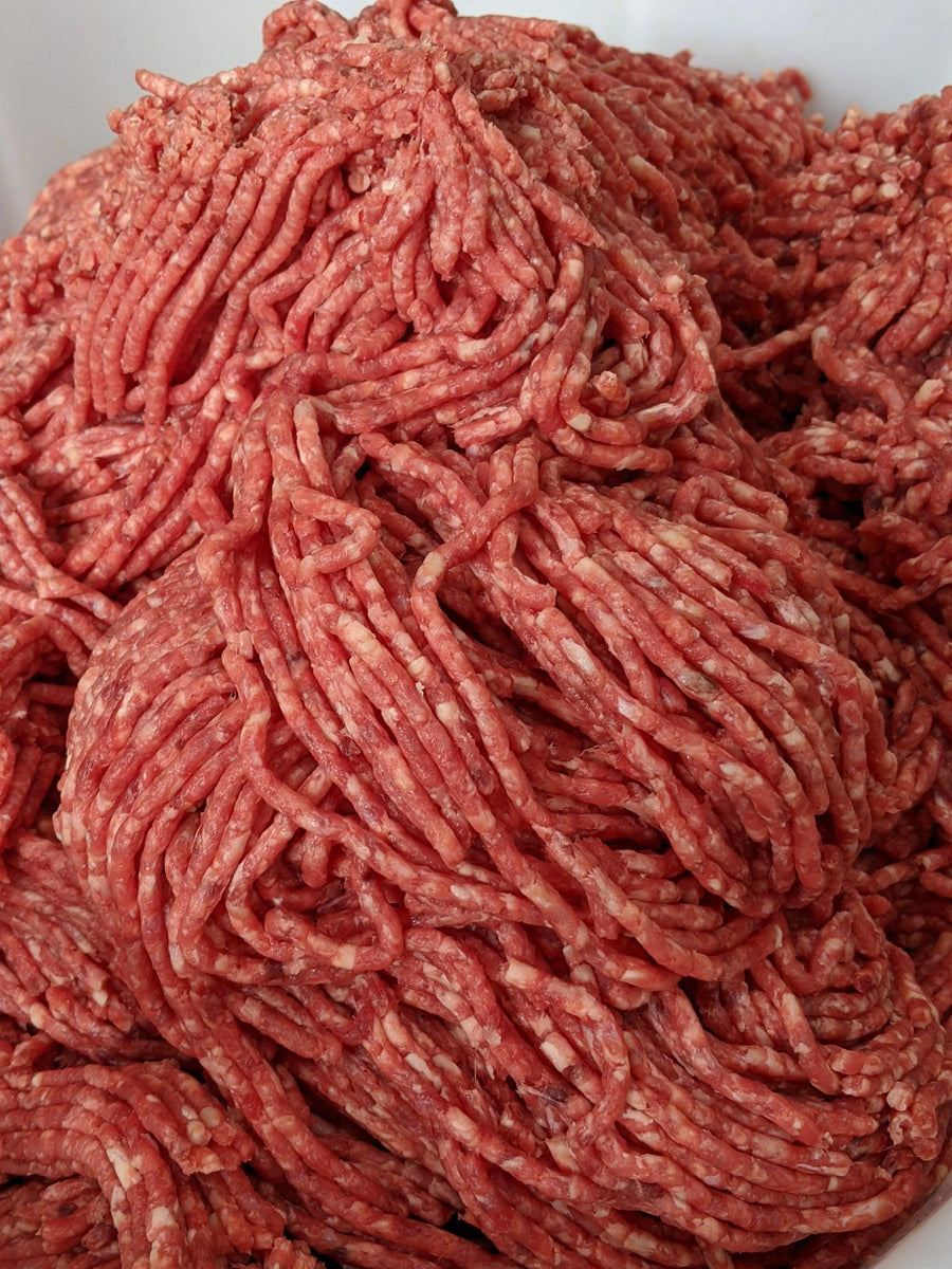 Close-up of ground meat on a white background — view 3